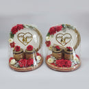 Luxury Sahi Chithi wedding with decorative dry fruit jars, artificial flowers, and first wedding invitation setup.