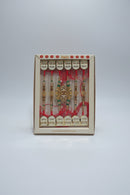 Six Shubh Lakshmi rakhi bracelets in their original white gift box 