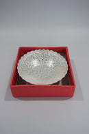 Decorative German silver plate with intricate patterns in a red box